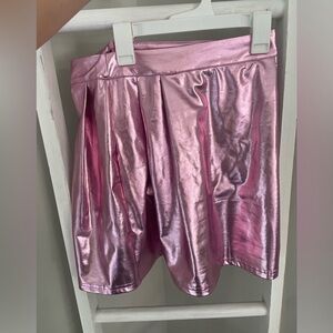 Metallic pink skirt.